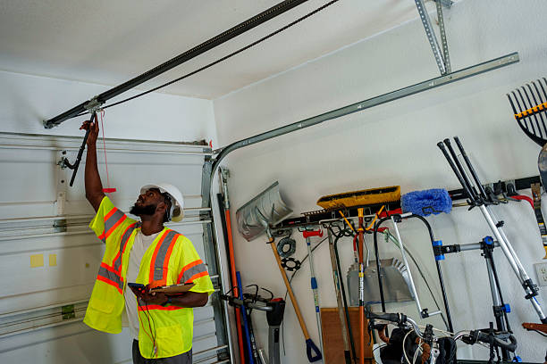 Professional Garage Door Installation technician working in Mena, AR